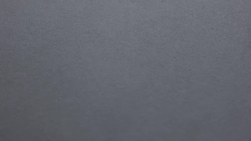 Abstract Gray Background with Dynamic Shifting Lighting