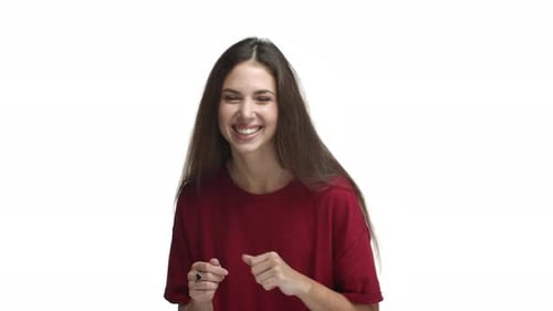 Smiling Woman in Red Shirt Looking at Camera