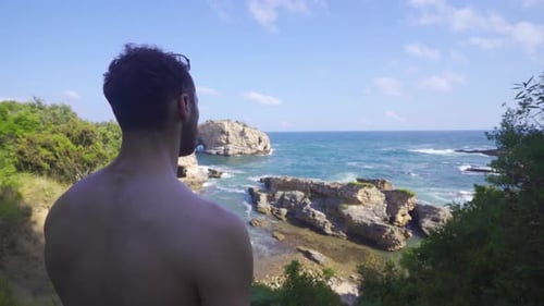 Looking at the sea view.