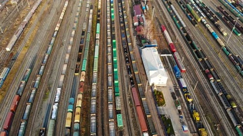 Aerial View of Freight Train Cars at Depot