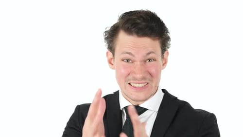 Man in Suit Shows Anger and Frustration