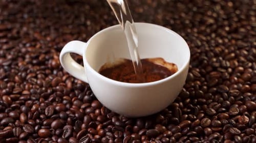 Side View Coffee Is Poured Into a Cup