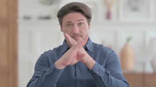 Adult Man Crossing Arms to Say No
