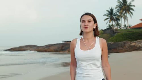 Woman Running on Tropical Beach Fitness Exercise