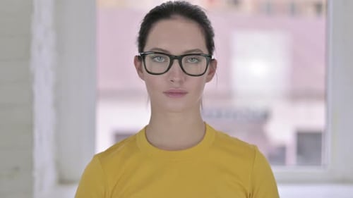 Portrait of Young Female Designer Looking at the Camera