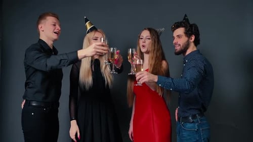 Group of Friends Toasting Champagne at Party