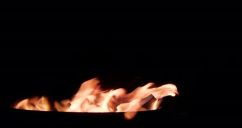 Flames of Fire in slow-motion on a dark background