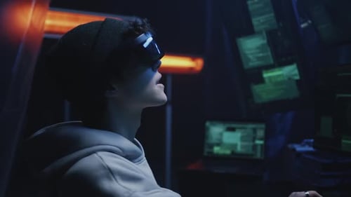 Young Hacker in Virtual Reality Glasses