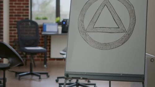 Close Up of Anonymous Alcoholics Sign on White Board in Office Used for Group Therapy Program