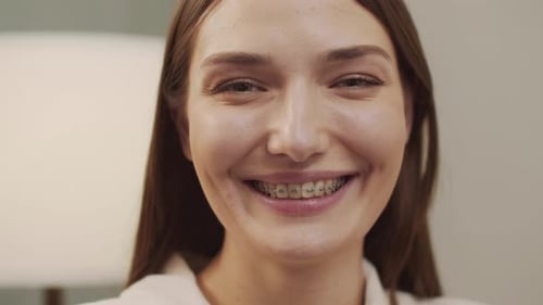 Smiling Person Wearing Dental Braces Close Up