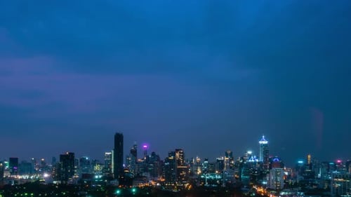 Time Lapse Night Cityscape and Highrise Buildings in Metropolis City Center
