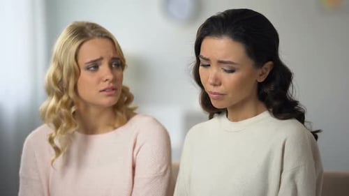 Woman Hugging and Supporting Her Upset Crying Friend, Health and Life Problems