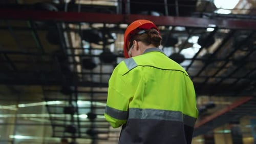 Supervisor Woman Analysing Work at Modern Manufacturing Production Warehouse