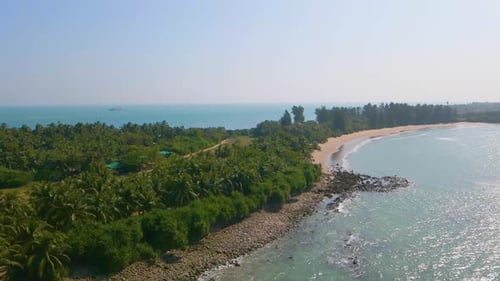 Majestic tropical island with palm tree forest surrounded by ocean water