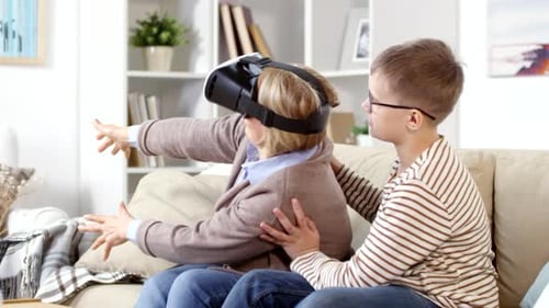Grandmother Experiences Virtual Reality with Grandson at Home