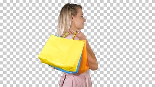 Blonde Woman Walking with Shopping Bags