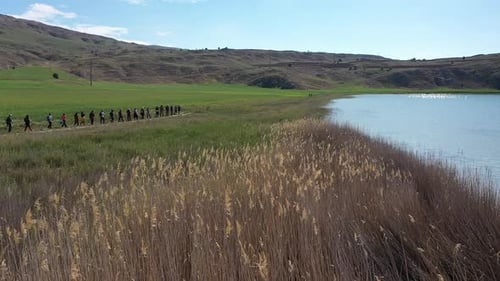 Trekking By The Lake In Aerial View 4