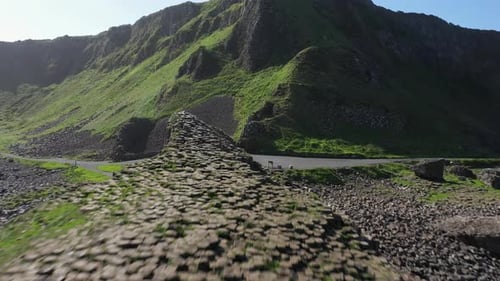 The Giants Causeway lies at the foot of the basalt cliffs along the sea coast on the north shores of