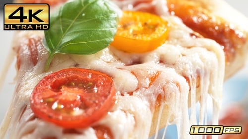 Delicious Slice of Pizza with Melted Cheese Close-Up