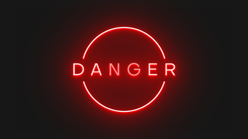Neon Danger Text Reveal with Looping Circle Animation