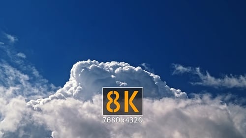 Beautiful White Clouds Moving Across Blue Sky