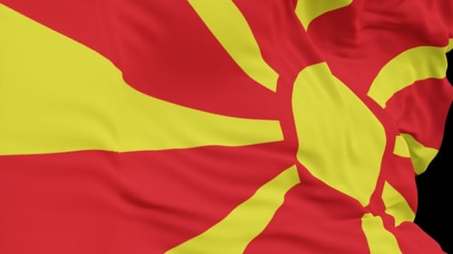The North Macedonia with alpha channel waving in the wind in slow motion