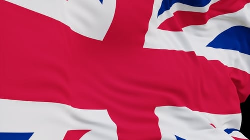 The United Kingdom flag with alpha channel waving in the wind in slow motion