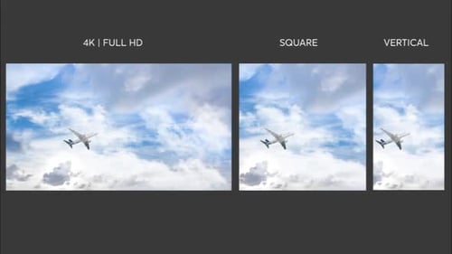 Airplane Flying Through Blue Sky With Clouds