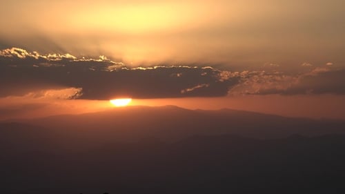 Majestic Mountain Range Sunset with Colorful Sky