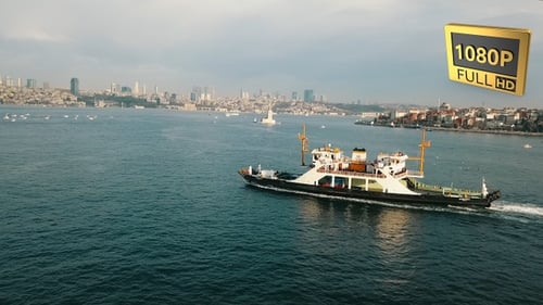 Aerial View of a Ferry Sailing in the City