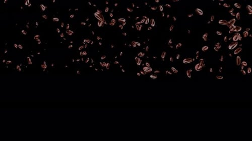 Geröstete 4K-Kaffeebohnen fallen in Zeitlupe auf braunem Schleifenhintergrund herunter.