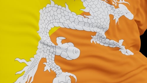 The Bhutan flag with alpha channel waving in the wind in slow motion