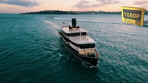 Vintage Ship Sailing on the Water at Sunset