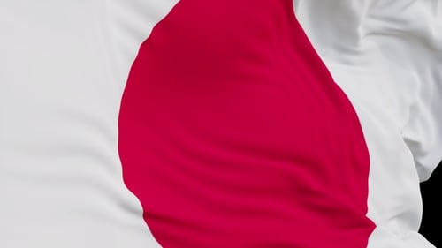 The Japan flag with alpha channel waving in the wind in slow motion