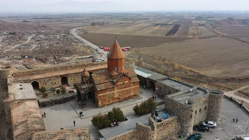 The ancient monastery in Armenia showcases remarkable architecture surrounded by picturesque valleys