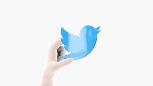 3D Hand Reveals Twitter Icon with Glowing Effect