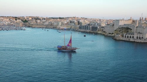 Exploring the stunning coastal views and historical architecture of Valletta, Malta at sunset.