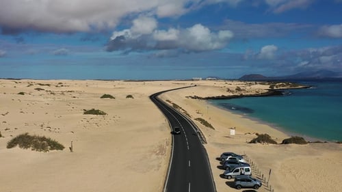 A road in the desert. Sand and outdoor road travel and journey. Freedom for transport and travel.
