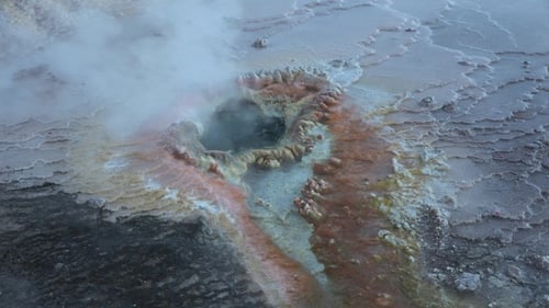 Bubbling Geothermal Pool Emitting Steam