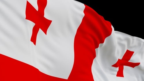 The Georgia flag with alpha channel waving in the wind in slow motion