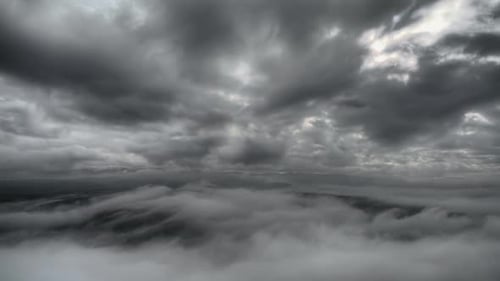 Aerial View of Stormy Clouds with Sunlight