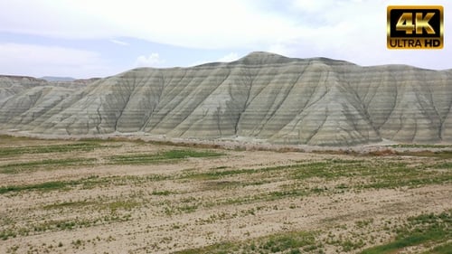 Green Striped Hills in an Open Landscape