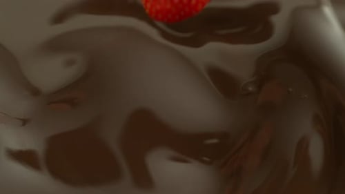 Strawberry Falling into Melted Chocolate Splash