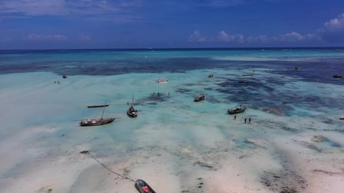 Sunny beach with white sand and turquoise waters. Beach panorama aerial view. Tropical beach.