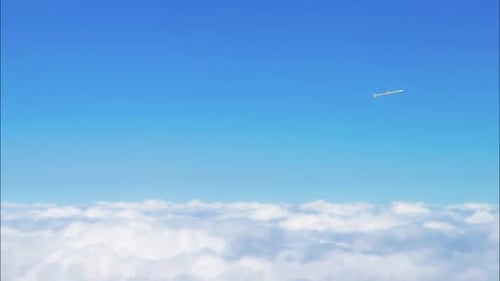Animated Rocket Flying in Clear Blue Sky Above Clouds