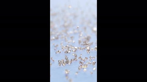 Sparkling Falling Diamond Particles Glittering Celebration Background