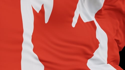 The Canada flag with alpha channel waving in the wind in slow motion