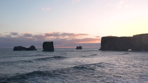 Waves and rocks of the Ocean. Beautiful seascape. Giant waves crashing against a rocky cliff.