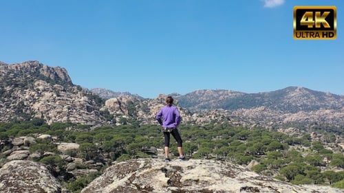 Hiker Woman Watching Nature From the Hill
