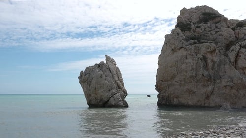 Picturesque beach, beautiful rocks, waves and turquoise water. Tropical nature. Summer holidays.